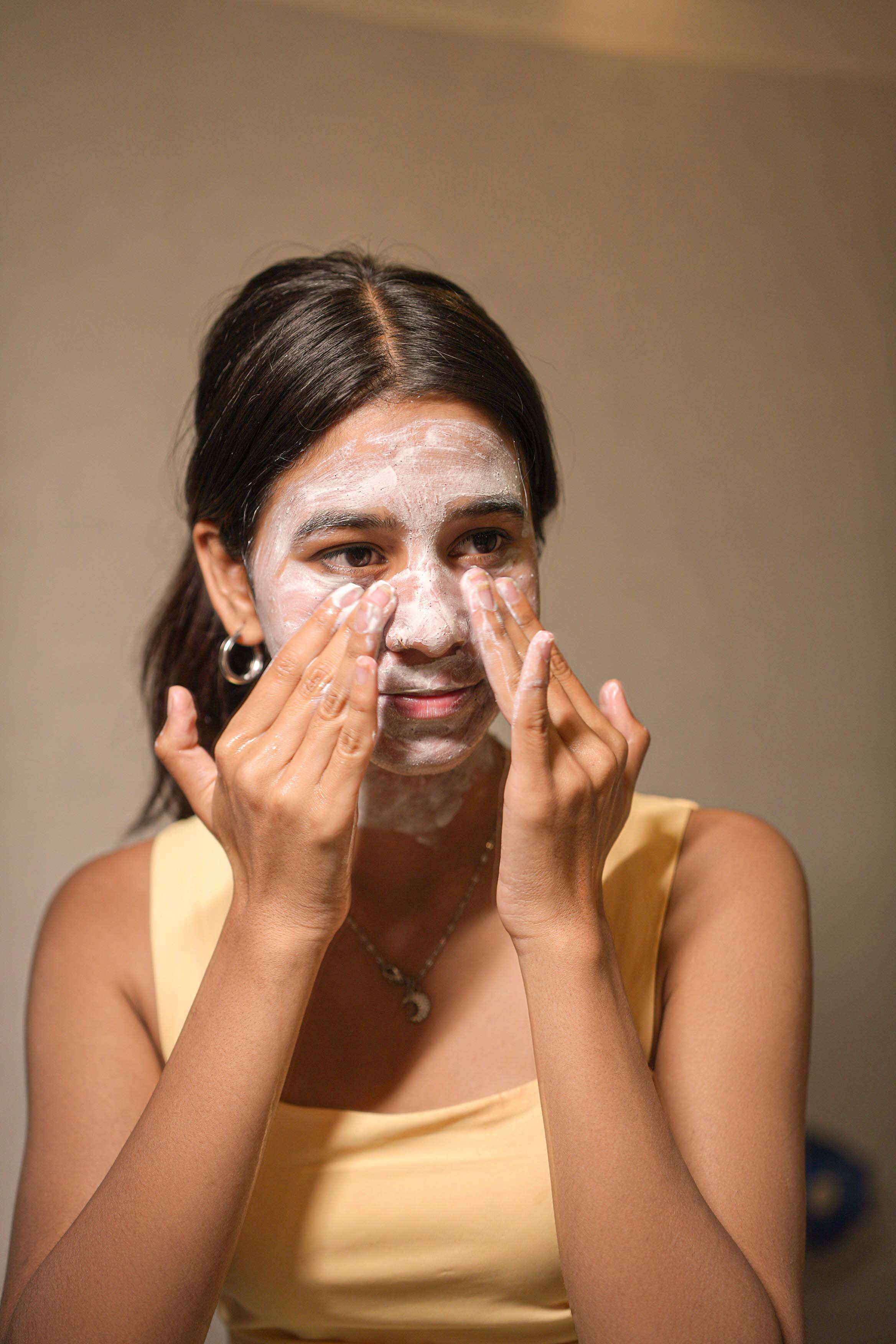 Gently massage in circular motions for 1–2 minutes, avoiding the eye area.