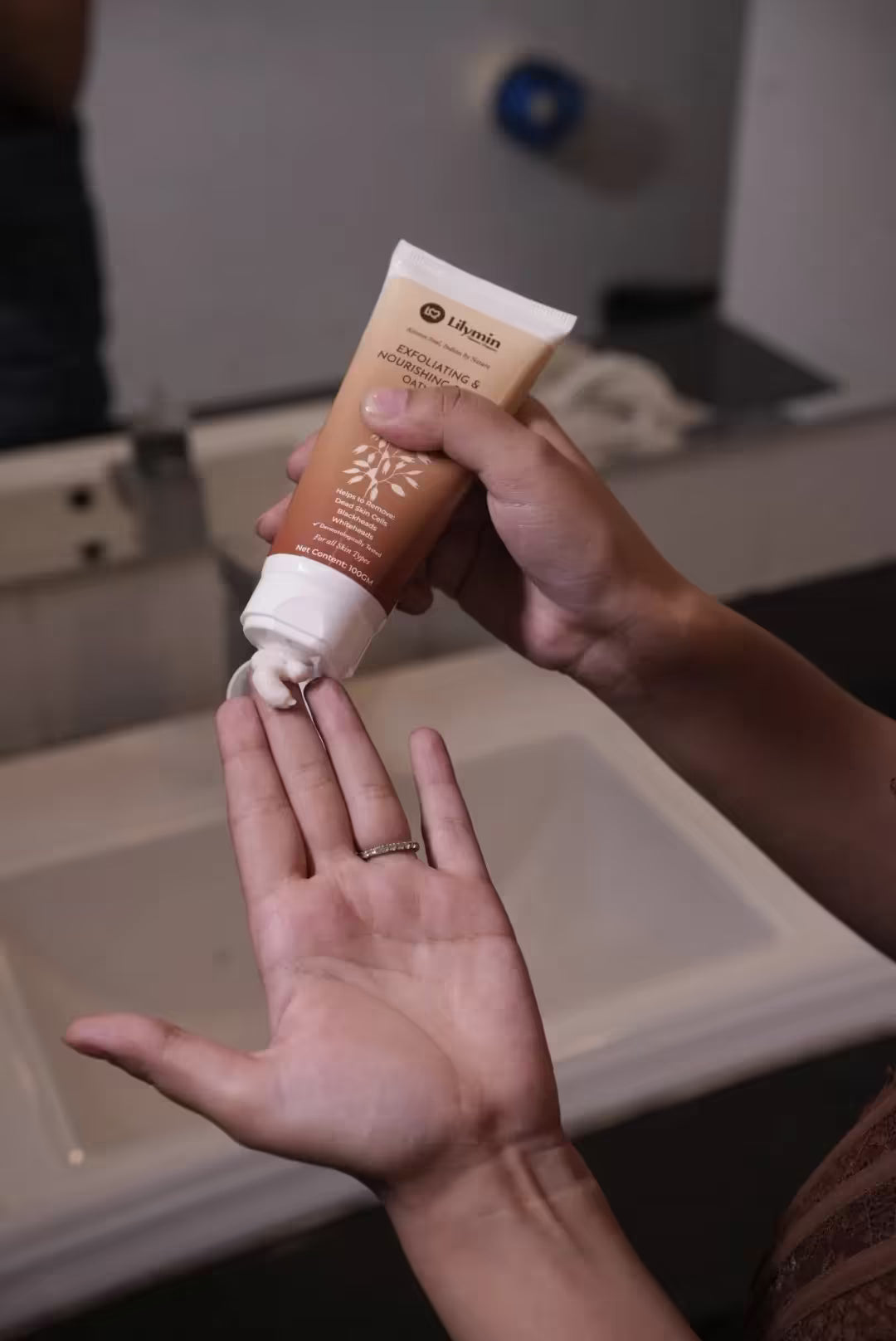 Apply a coin-sized amount to a damp face.